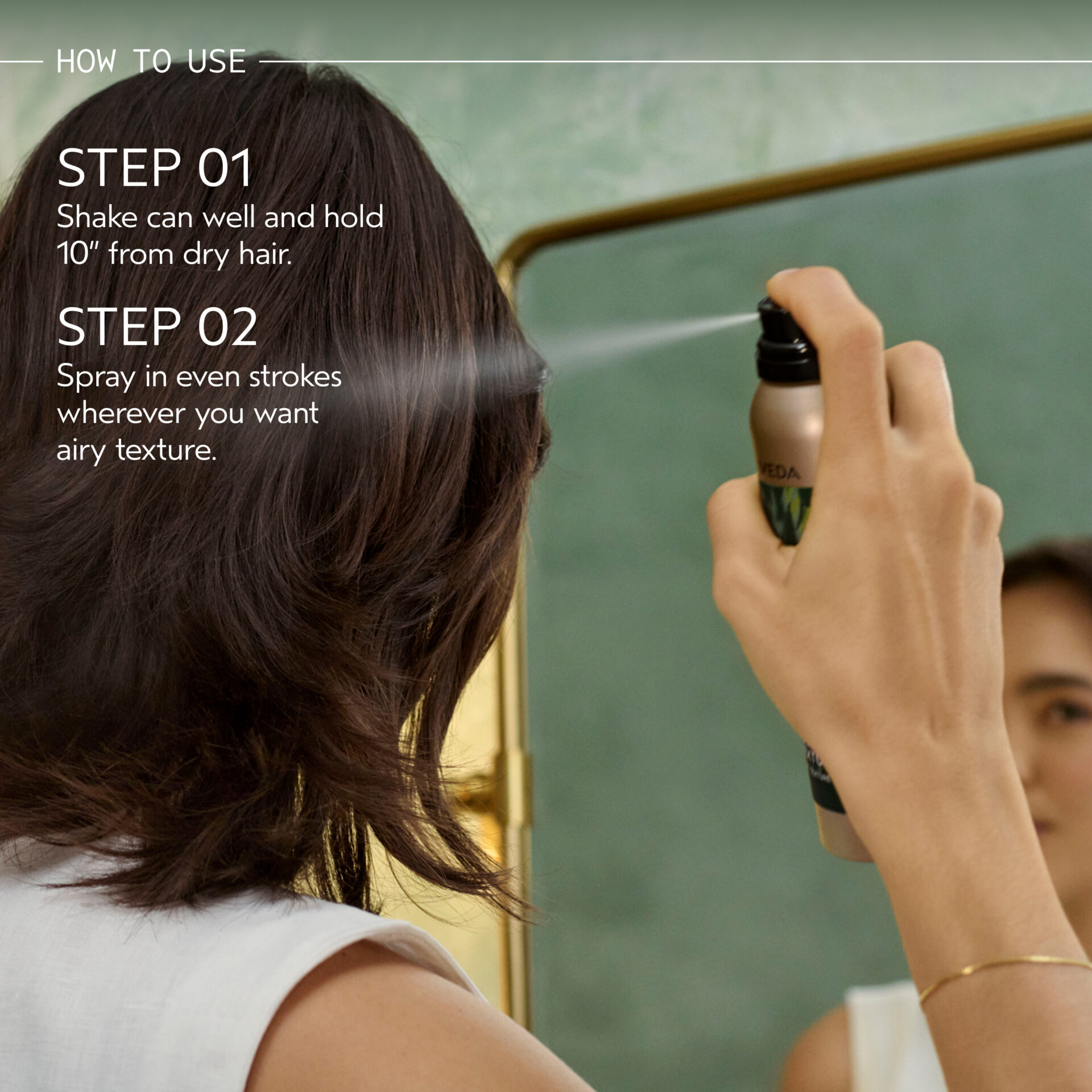A person sprays earth-friendly hair styling product onto their hair while looking in a mirror, following step-by-step instructions on the image for applying the eco-friendly hair product—perfect for celebrating Earth Month. - Mango Salon, VA
